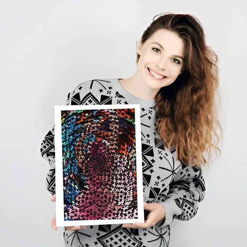 Woman holding a colorful abstract art print against a white background