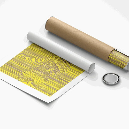 Roll of yellow patterned paper with a cardboard tube on a white background