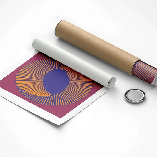 Roll of paper with a geometric design, cardboard tube, and metal button on a white background