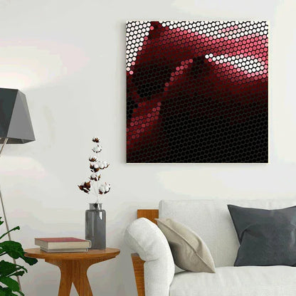 Living room with a modern abstract art piece on the wall, a sofa, and side table.