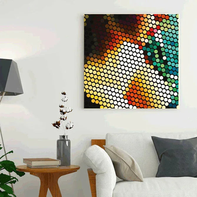 Colorful abstract wall art above a sofa in a living room.