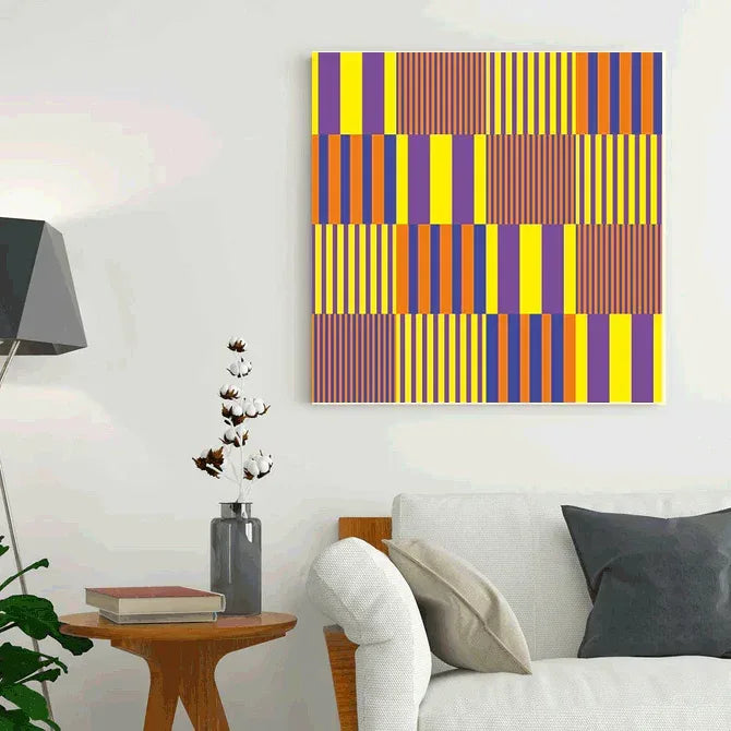 Living room with a colorful abstract painting on the wall, a couch, and side table.