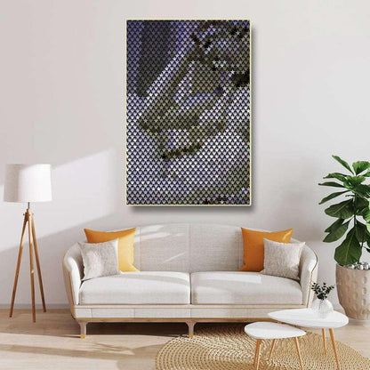 Living room with a white sofa, abstract art on the wall, and decorative elements.