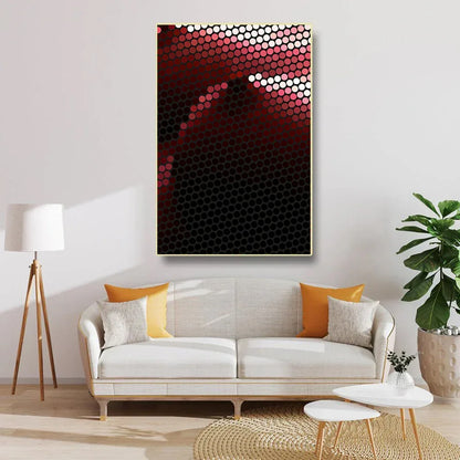 Living room with a modern sofa, abstract art on the wall, and decorative elements.