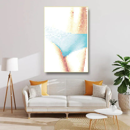 Living room with a modern sofa, abstract art on the wall, and decorative elements.