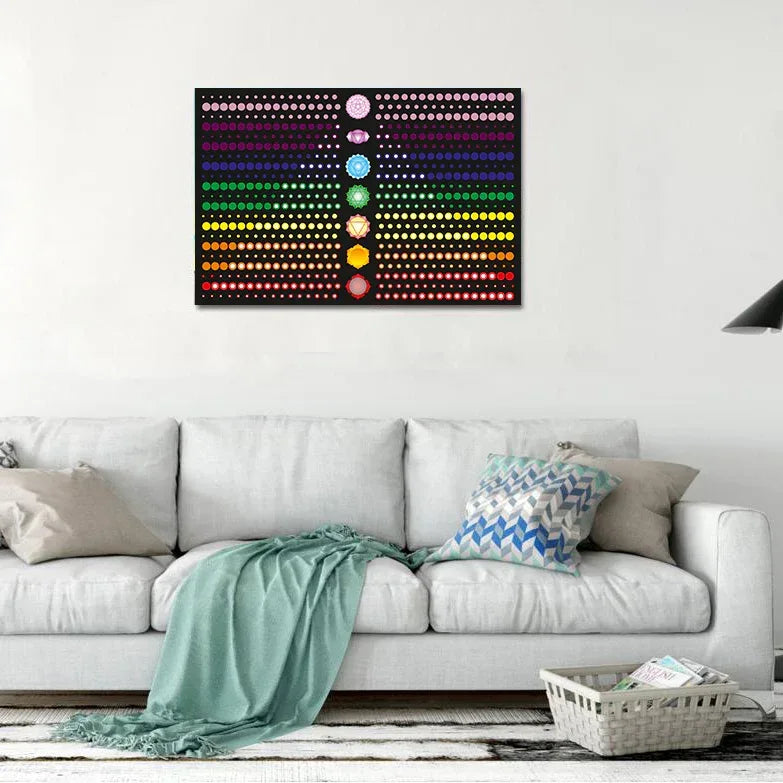 Colorful dot matrix wall art above a white sofa in a living room.