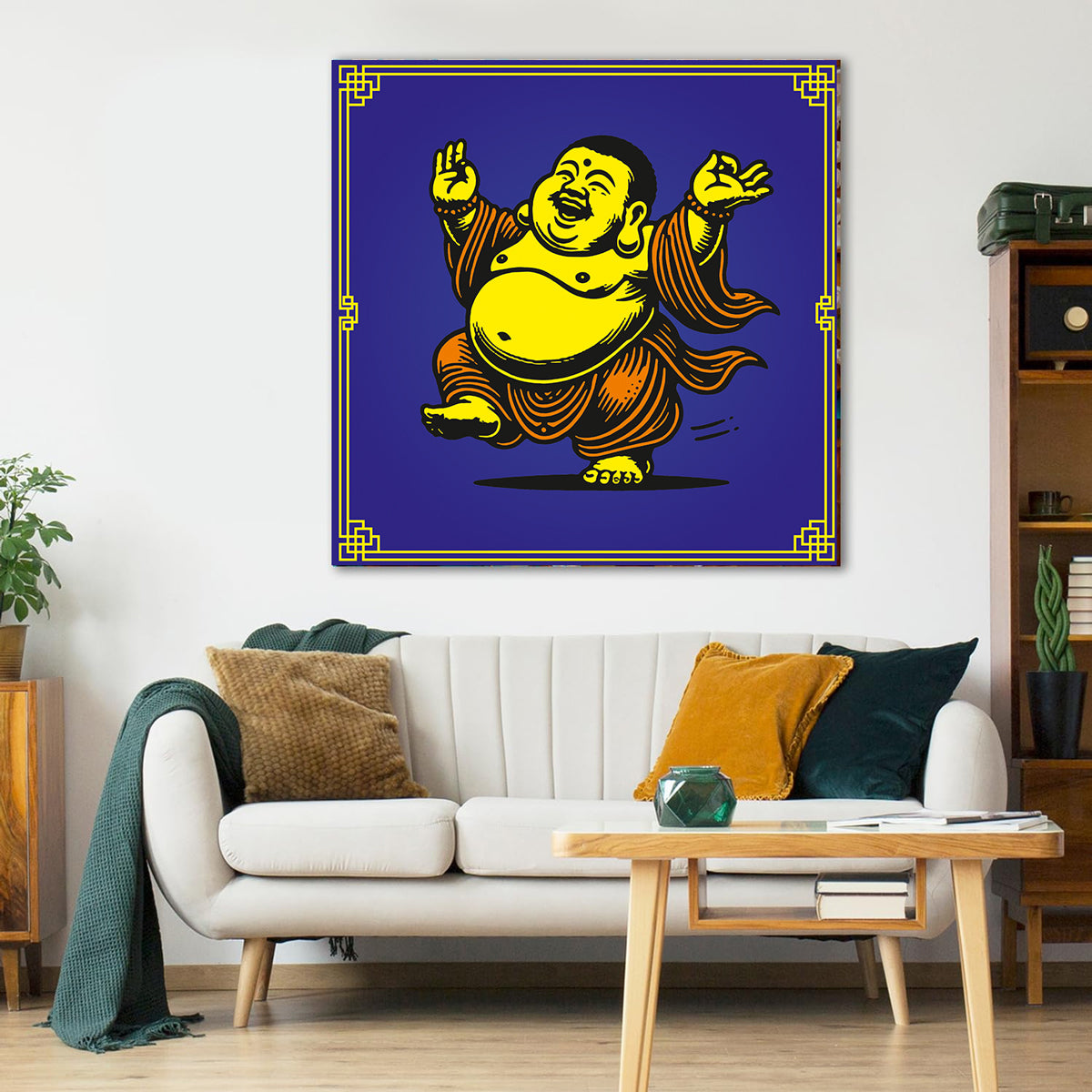 Living room with a white sofa, wooden coffee table, and a framed artwork of a laughing Buddha on the wall.