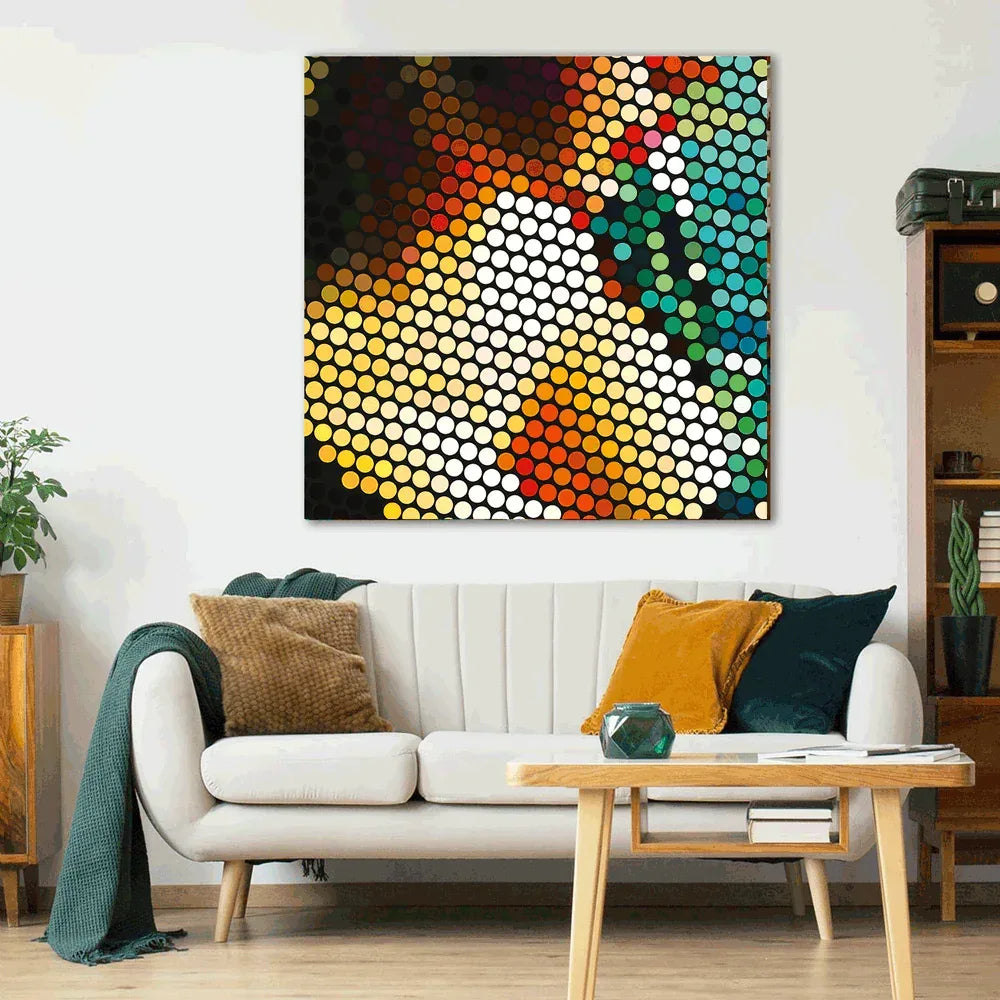 Colorful abstract wall art above a white sofa in a living room.