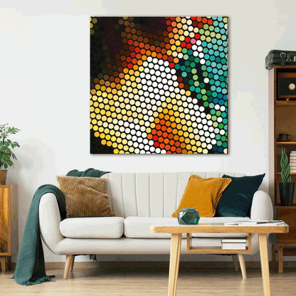 Colorful abstract wall art above a white sofa in a living room.