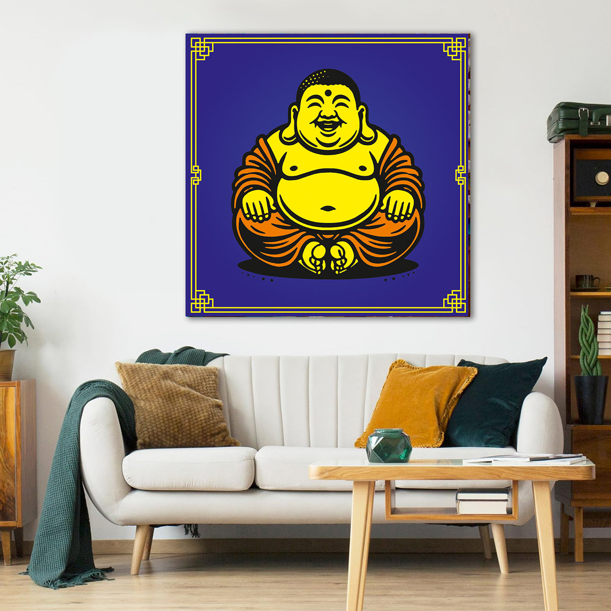 Living room with a white sofa, wooden coffee table, and a large framed picture of a smiling Buddha on the wall.