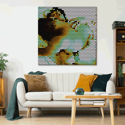 Sofa in a living room with a colorful abstract painting on the wall.