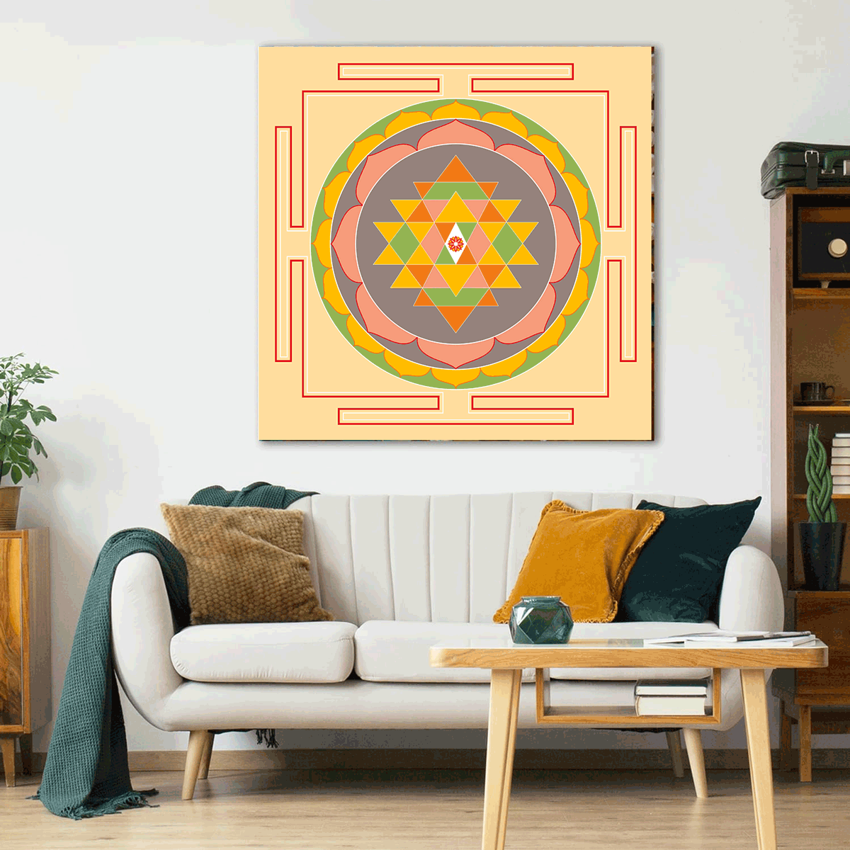 Living room with a colorful mandala painting on the wall above a white sofa.
