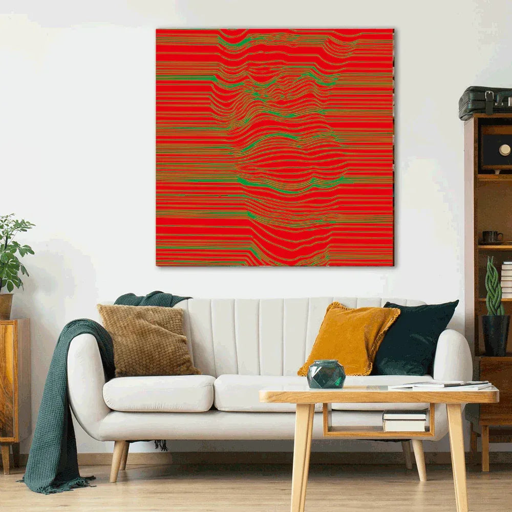 Living room with a red and green abstract painting on the wall, white sofa, and wooden coffee table.