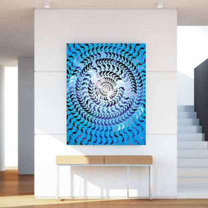 Abstract spiral artwork on a wall in a modern interior setting