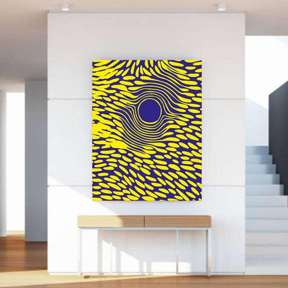 Abstract art piece with yellow and blue pattern on a white wall
