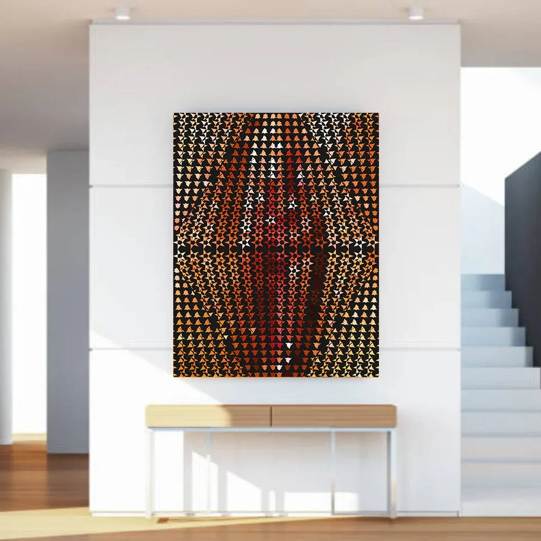 Abstract art piece on a white wall in a modern interior setting