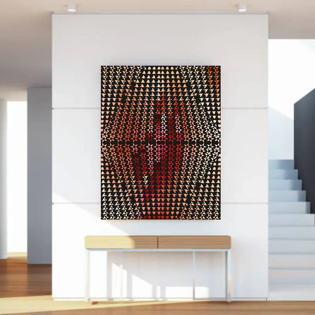 Abstract art piece on a white wall in a modern interior setting