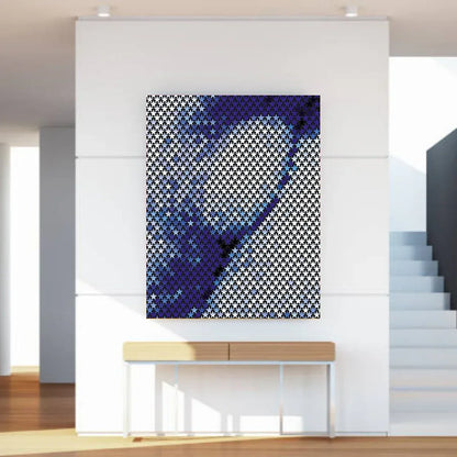 Abstract art piece on a wall in a modern interior setting