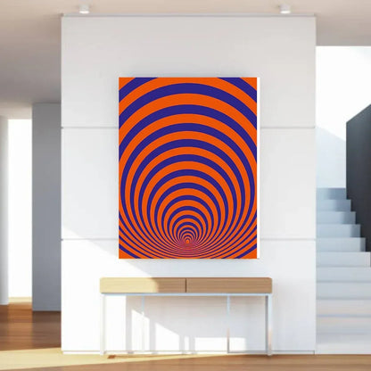 Abstract art with orange and blue concentric circles on a white wall.
