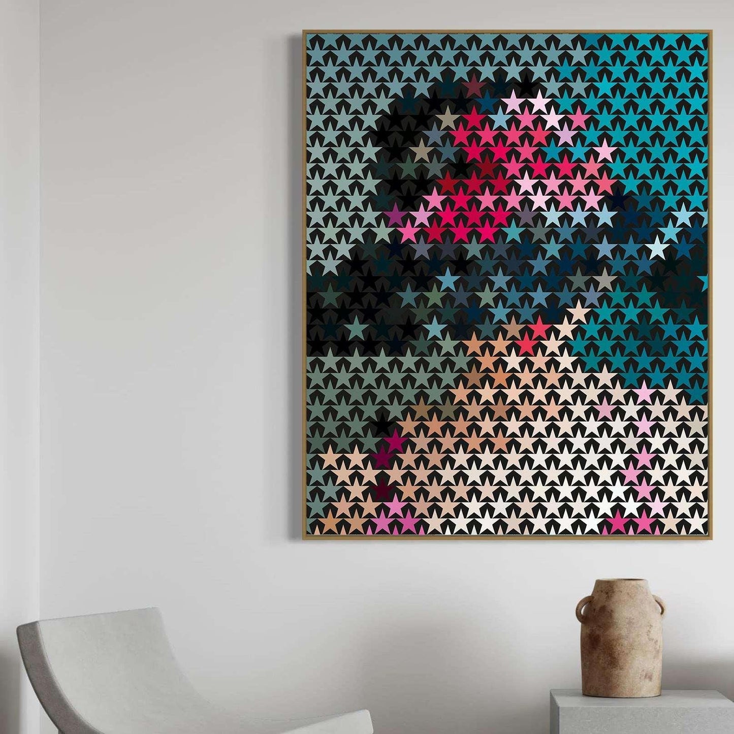 Colorful abstract wall art on a white wall with a chair and vase in the foreground.