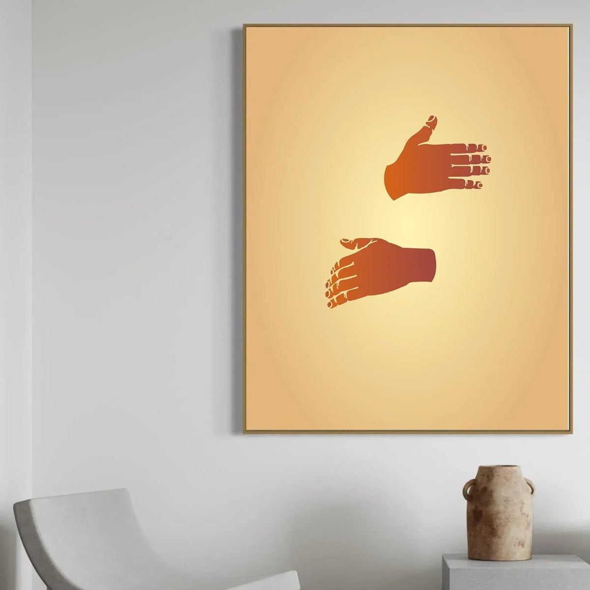 Framed artwork with red hand and foot illustration on a beige background, displayed on a wall.