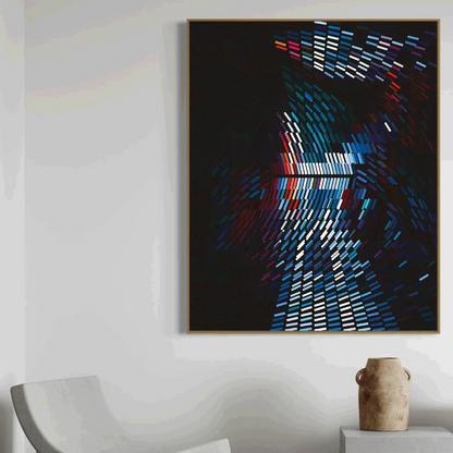 Abstract artwork with colorful geometric design on a white wall
