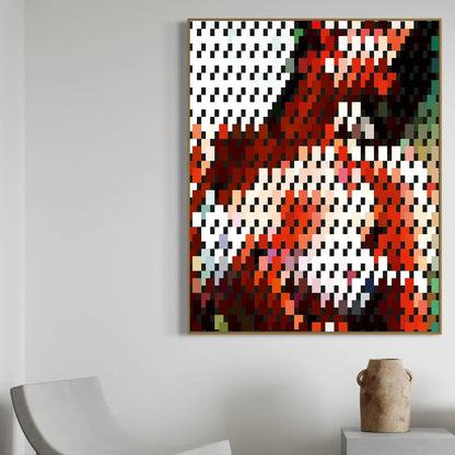 Abstract pixel art painting on a wall with a chair and vase in the foreground.