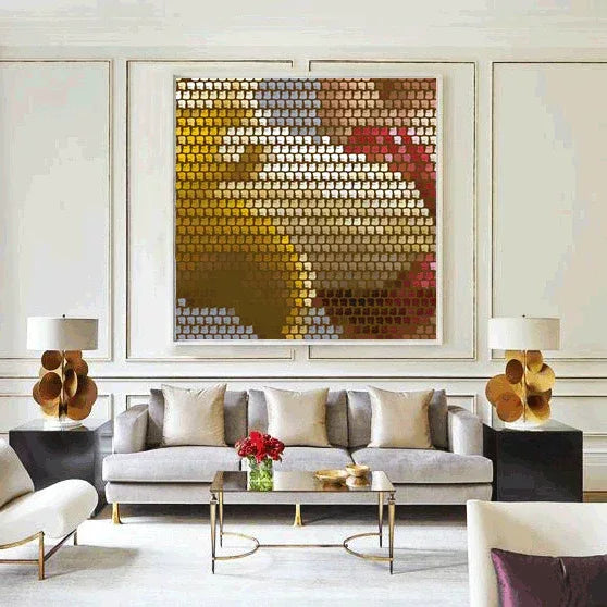 Modern living room with a large abstract painting, gray sofa, and decorative items.