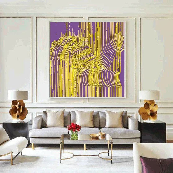 Modern living room with a gray sofa, coffee table, and abstract art on the wall.