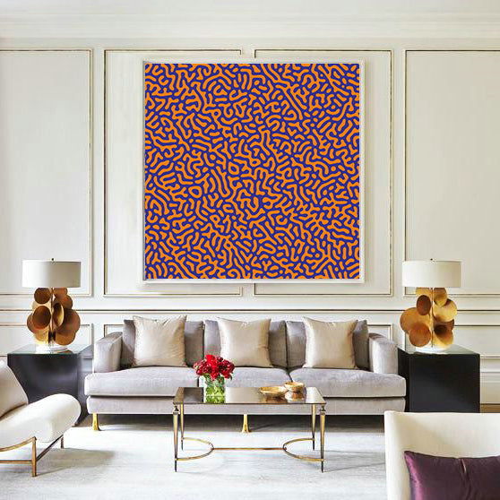 Modern living room with a gray sofa, abstract orange and blue painting, and decorative lamps.