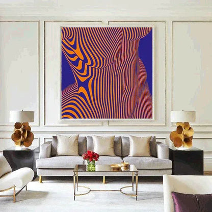 Modern living room with a gray sofa, abstract art, and decorative items.