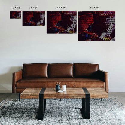 Cozy home self‑care corner with a small dot‑art print above a journal and candle.