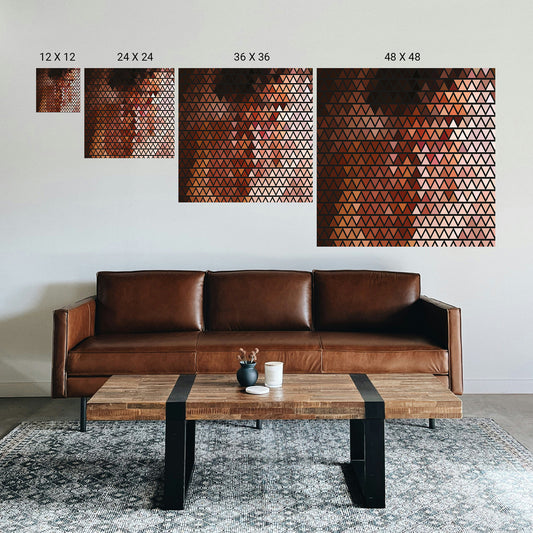 Brown leather sofa in a living room with wall art displaying geometric patterns.