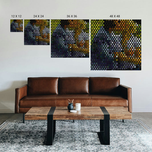 Brown leather sofa in a living room with abstract art on the wall.