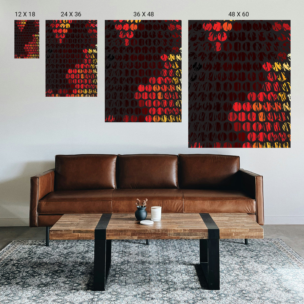 Living room with a brown leather sofa, wooden coffee table, and abstract art prints on the wall.