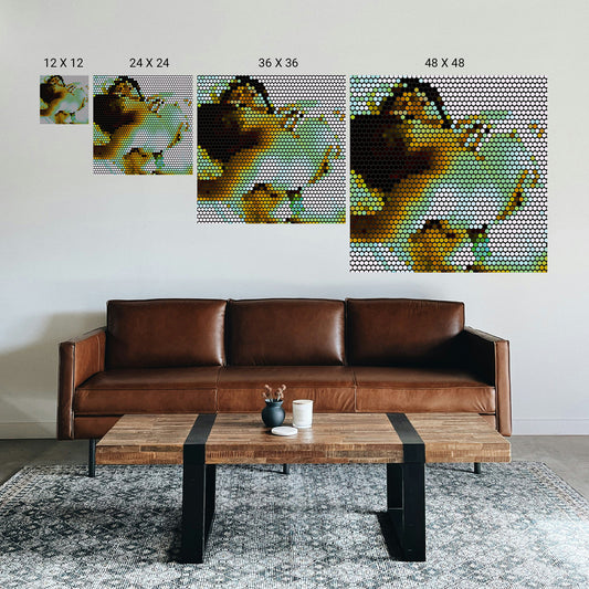 Living room with a brown leather sofa, wooden coffee table, and wall art displaying a woman's face.