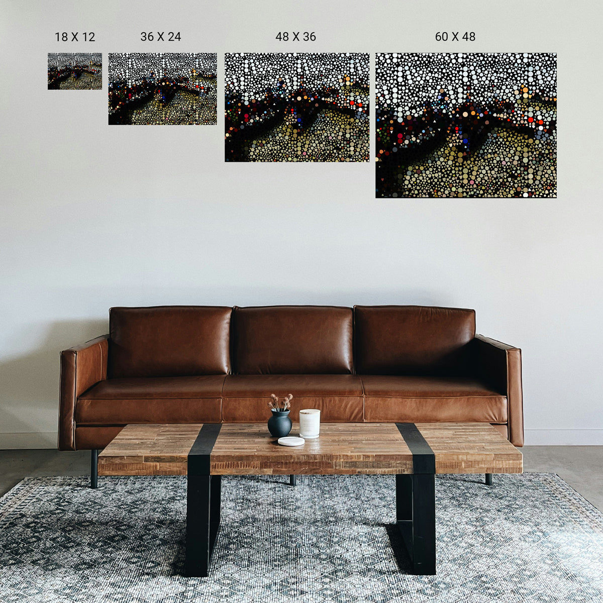 Reception desk area in a counseling center with a serene abstract print behind staff.