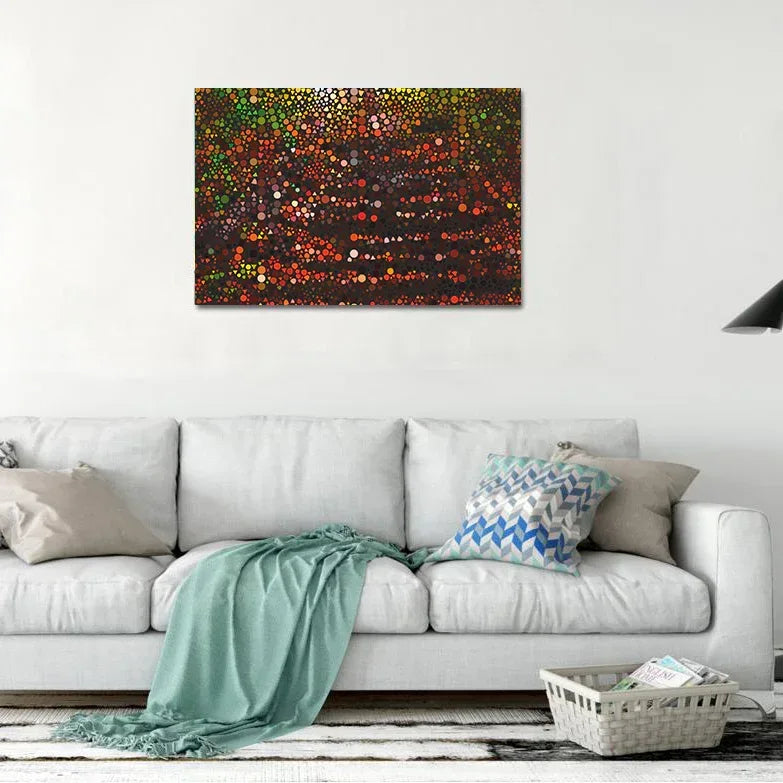 Colorful abstract painting on a white wall above a white sofa with decorative pillows.