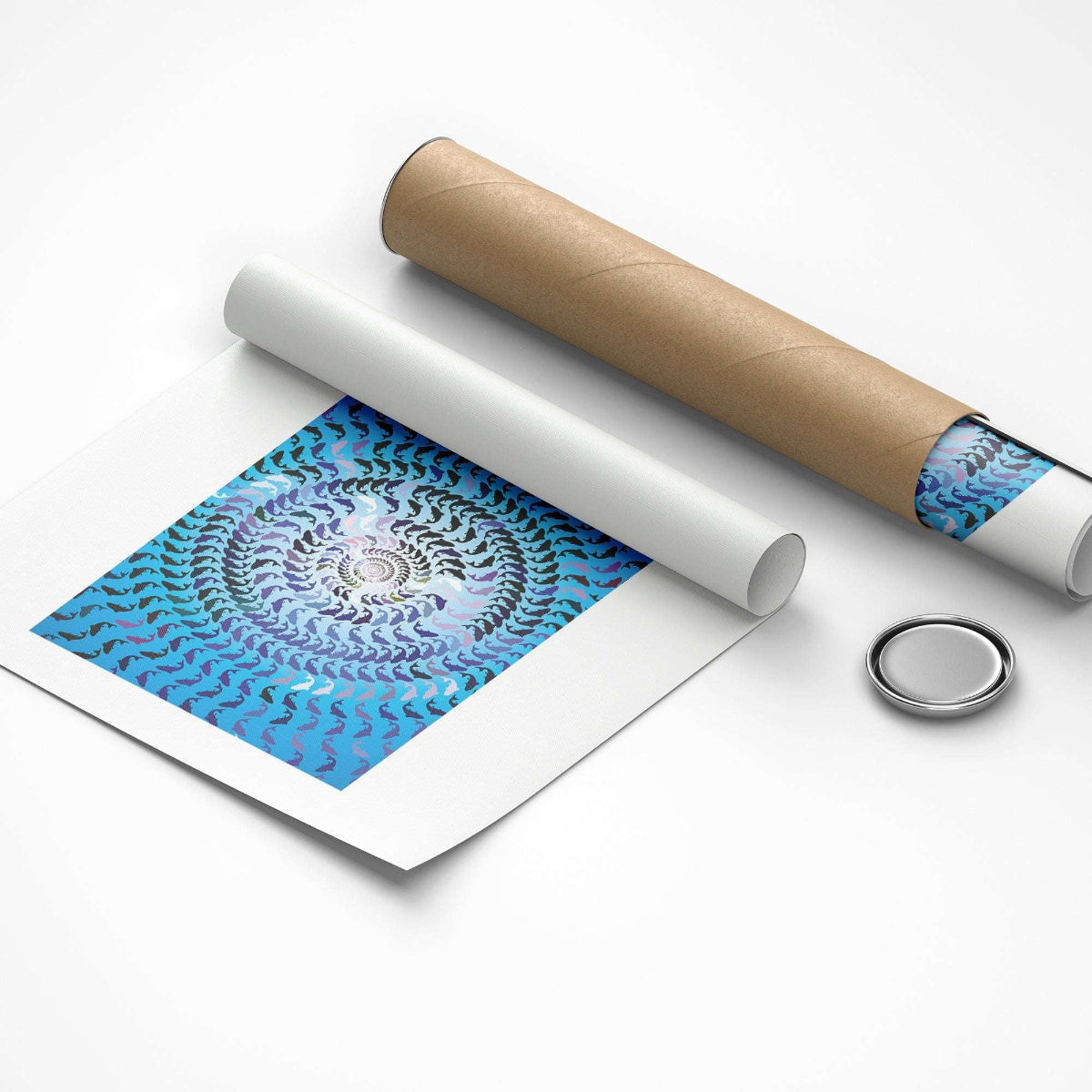 Unrolled paper with blue pattern, roll of paper, and metal button on a white background