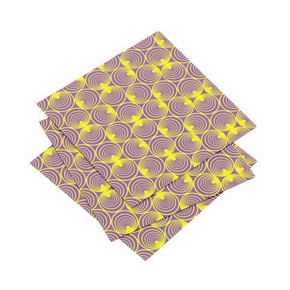 Two purple and yellow patterned napkins on a white background