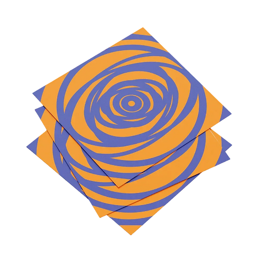 Three orange and blue spiral patterned napkins on a white background