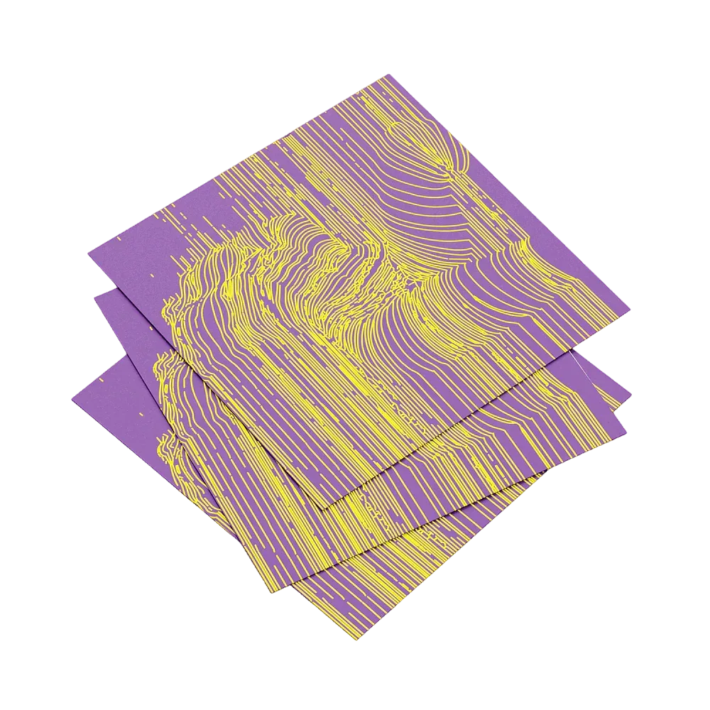 Four purple and yellow patterned napkins stacked on a white background