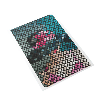 Colorful star-patterned paper on a white background