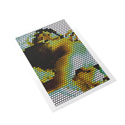 Sheet of diamond painting with a sunflower design on a white background