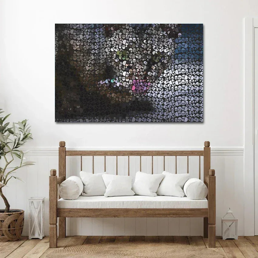 Wooden bench with white cushions in a room with a large abstract painting on the wall.