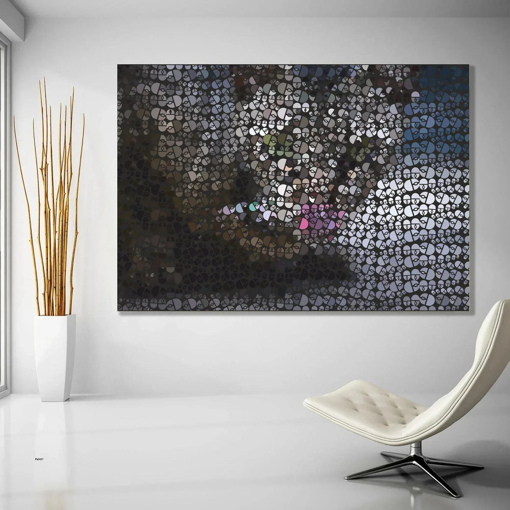 Abstract art piece on a wall with a modern chair and plant in the foreground.